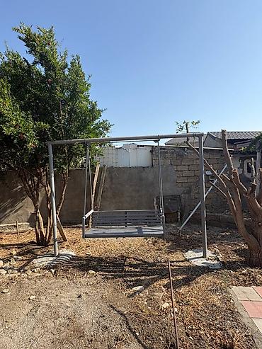 saxta baba satisi: Həyətdə istifadə edilmiş yelləncək satılır. Metal konstruksiyası saz — 4