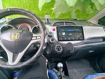 xpeng g3: Honda Fit: 2009 г., 1.5 л, Механика, Бензин, Хэтчбэк — 1