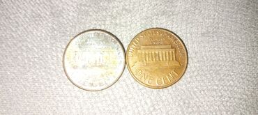 Sikkələr: 1973 və 1993 illin Amerika qəbikləri(cent) satıram