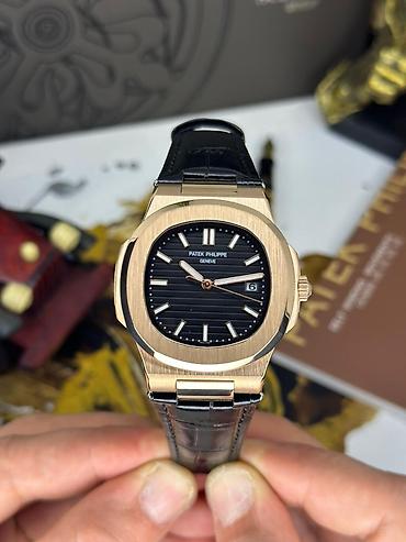 Aksesuarlar: Patek Philippe Nautilus – klassik lüks saat Xüsusiyyətlər: - Korpus — 6