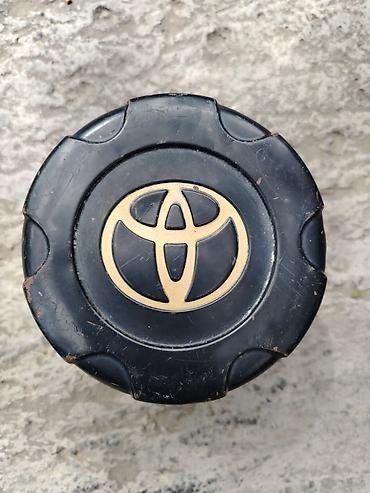 Kolpaklar: Toyota mərkəz qapağı (center cap) – qara rəngli, qızılı Toyota loqosu — 1