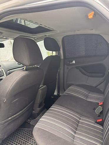 kia rio qapi: Ford Focus – gümüşü rəng, 5 qapılı hetçbek. Texniki və xarici — 4