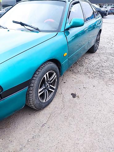 салон ваз 2114: Mazda 626: 1995 г., 1.8 л, Механика, Седан — 10