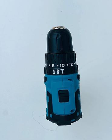mini drel: Makita akkumulyatorlu vurucu/şurup sıxan dəsti Məhsulun tərkibi: - — 3