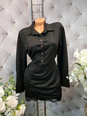 mango ogrlice: Crna košulja-haljina elegantnog kroja sa dugim rukavima. Model ima — 1