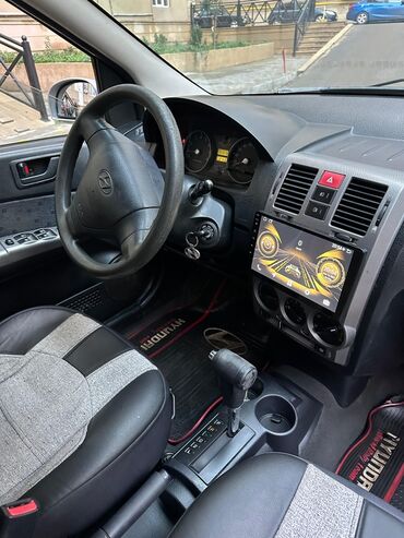 Hyundai: Hyundai Getz, gümüşü rəng Texniki xüsusiyyətlər: - Yanacaq növü — 10