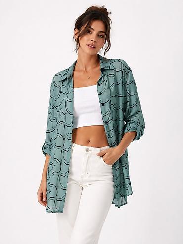 baş ortuyu: Zərif naxışlı, oversize üslubda qadın köynəyi. Model açıq yaşıl (mint — 1