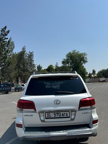 шины на lx570: Белый внедорожник Lexus9 LX 570 с багажником на крыше. Автомобиль
