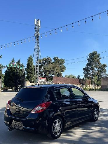 volkswagen tiguan 150 л с: Nissan Tiida: 1.5 л | 2011 г. Хэтчбэк — 7