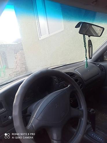 эбу ипсум: Mitsubishi Mirage: 1999 г., Бензин, Седан — 7