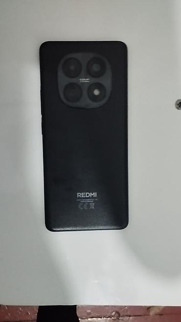 note 10 s: Arxa tərəfində "REDMI" brendi və "108MP" yazısı olan qara rəngli — 1