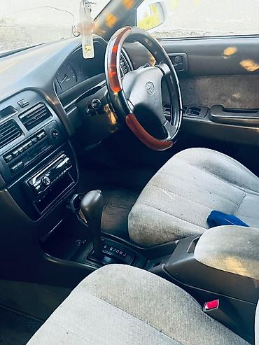 Toyota Carina E: 1995 г., Автомат, Седан — 4