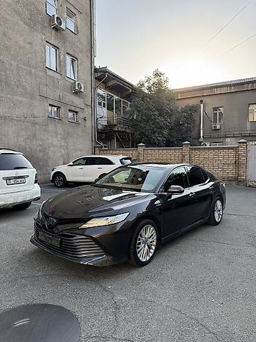 byd e2 2025: Toyota Camry: 2018 г., 2.5 л, Вариатор, Гибрид, Седан — 1