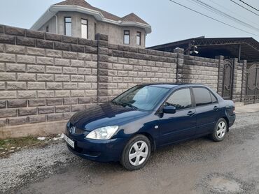 Mitsubishi: Mitsubishi Lancer: 2005 г., 1.6 л, Механика, Бензин, Седан