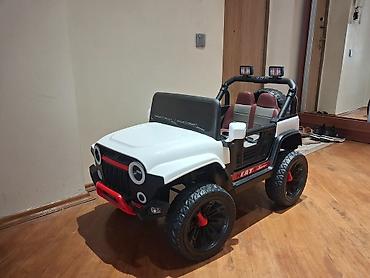 Детские электрокары: Uşaq elektrikli jeep maşını yeni kimidi az istifadə olub - Korpusu — 1