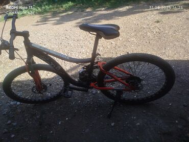 gence velosiped satisi: JUXIN amortizatorlu və Shimano komponentli, parlaq qara və narıncı