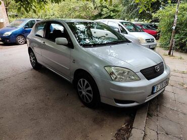 Transport: Toyota Corolla: 1.4 l | 2003 year Hatchback