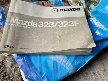Сервисная книжка Mazda 323f