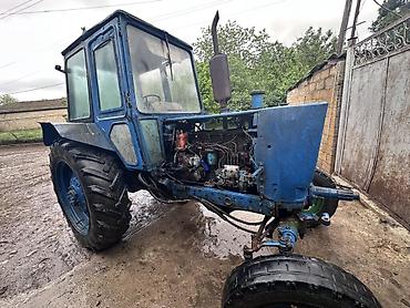 Kommersiya nəqliyyat vasitələri: Mavi rəngli universal təkərli traktor Texniki xüsusiyyətlər və — 1