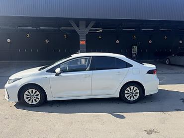 95: Toyota Corolla: 2021 г., 1.8 л, Вариатор, Гибрид, Седан — 5