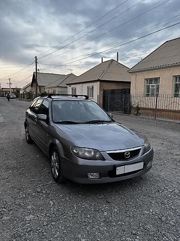 мазда срочно: Mazda 323: 2003 г., 1.6 л, Автомат, Бензин, Универсал — 1