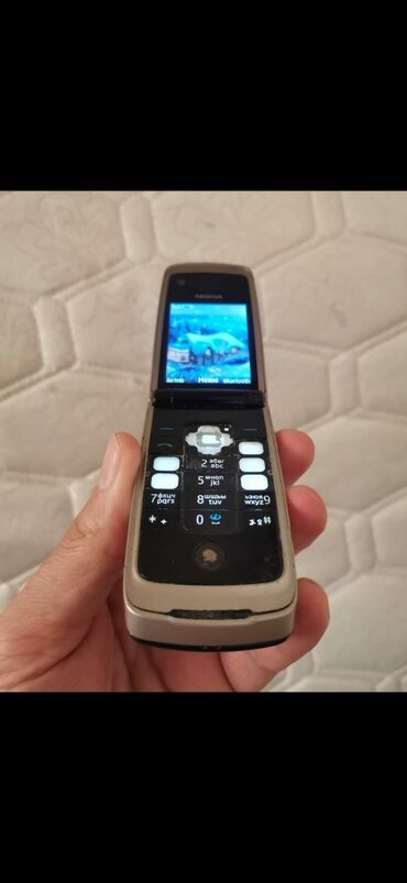 mutfaq oyuncaqları: Nokia telefonu qapaqlı telefon tam arginal əla işləyir
