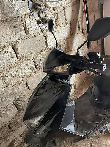 elektrikli scooter tap az: Elektrik skuter – qara rəng - Şəhərdaxili sükutlu və qənaətli hərəkət — 1