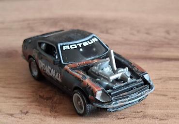 cusa 10872: Hot Wheels die-cast model maşın – Roadkill “Rotsun” (Custom Datsun — 1