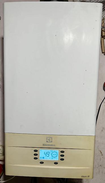 kombi batareyasi: Kombi 24 klv Əla vəziyyətdə İsti suyuda radyatorlarıda əla qızdırır — 1