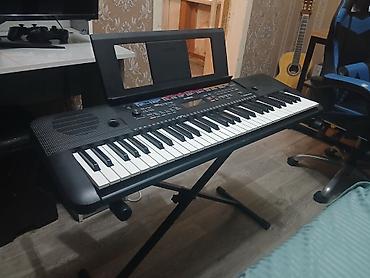 Продаю или меняю Синтезатор Yamaha PSR-E263 с нотной подставкой и