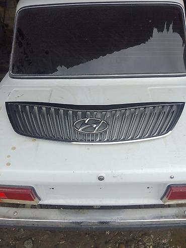nissan march: Hyundai üslubunda dekorativ arxa baqaj barmaqlığı (radiator barmaqlığı — 1
