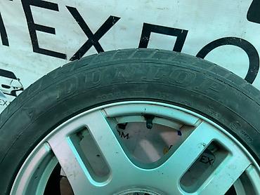 g comp: Колесо в сборе Dunlop 205/55R16H, Диск литой оригинальный Volkswagen — 4