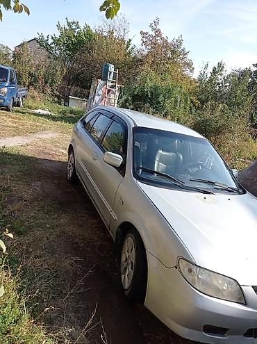 дачный: Mazda Familia: 2002 г., 1.3 л, Механика, Бензин, Хэтчбэк — 2