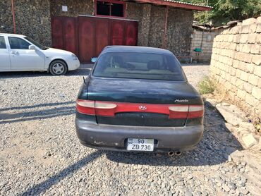 Автомобильные масла: Hyundai Marcia: 2 л | 1998 г. Седан