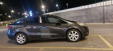 ucuz avtomobil: Kia Rio: 1.4 l | 2011 il Sedan