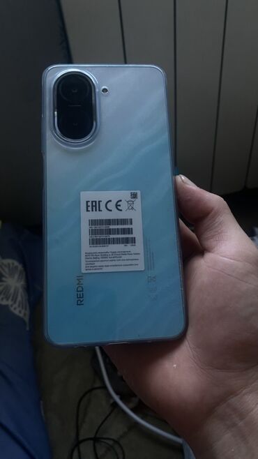 а 10 с: Продается смартфон Redmi A5 в цвете Ocean Blue. Телефон оснащен