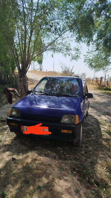 оборудование для шиномонтаж: Автомобиль Daewoo Tico DX синего цвета, оснащенный четырьмя дверями