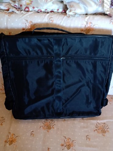 putna torba: Putna torba za kacenje i nosenje. sa dva ofingera i kukom za