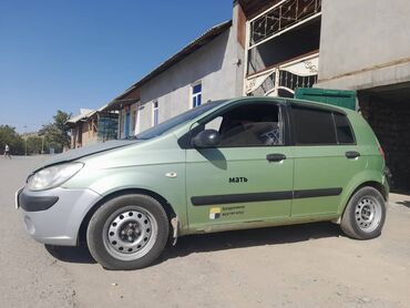 сапожный инструмент: Hyundai Getz, 5‑дверный хэтчбек, зеленый с серебристыми элементами