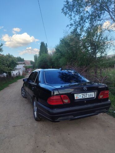 малометражки машины в бишкеке: Седан Mercedes-Benz E55 AMG черного цвета с затемненными стеклами. На