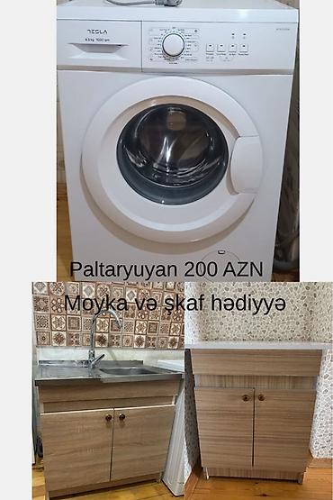 mikser en ucuz: Tesla paltaryuyan maşın, ön yükləməli. - Yük tutumu: 6.5 kq - Sürət — 1