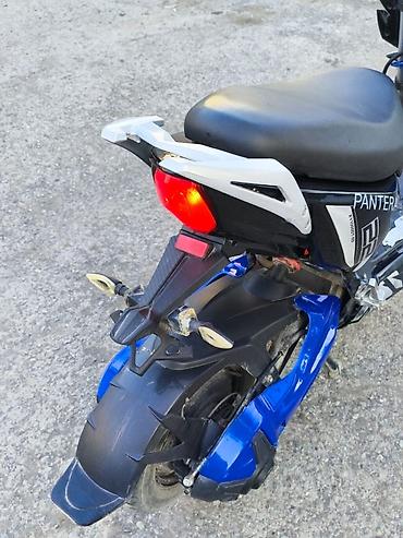 Скутеры: Скутер Pantera. - Яркая передняя оптика: две основные фары — 11