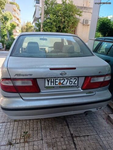 Οχήματα: Nissan Almera: 1.4 l. | 1999 έ. Λιμουζίνα