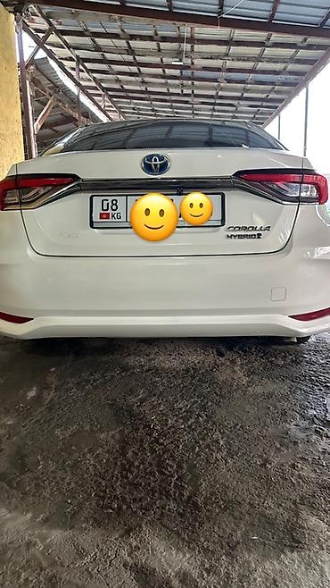byd e1: Toyota Corolla: 2019 г., 1.8 л, Гибрид, Седан — 1
