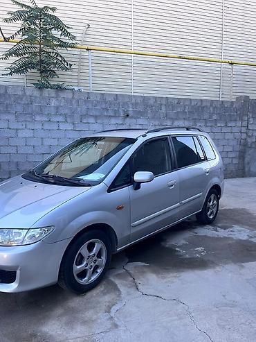 саната желтый: Mazda PREMACY: 2004 г., 1.8 л, Механика, Бензин, Универсал — 5