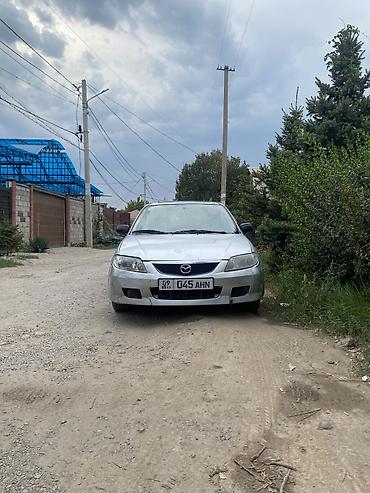 трамблёр мазда 323: Mazda 323: 2003 г., Механика, Дизель, Хэтчбэк — 6