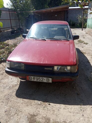 авто машына: Mazda 626: 1987 г., 1.8 л, Механика, Бензин, Седан