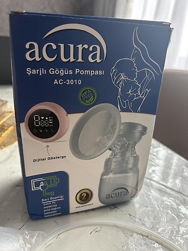 Uşaq dünyası: Süt sağan aparat. Yenidir. Demək olarki istifadə edilməyib.masaj — 2