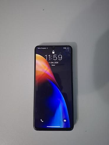 note 50 pro: Mavi rəngdə, böyük ekranlı smartfon. Cihazın ön hissəsində damla — 1