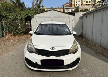 Saturn: Kia Rio: 1.6 л | 2014 г. Седан